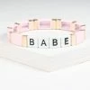 Faire (Ryan Porter) Pink & Gold Babe Word Bracelet