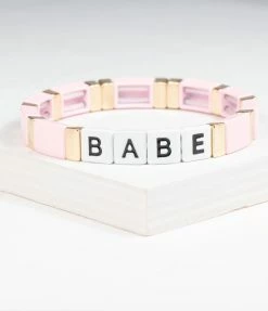 Faire (Ryan Porter) Pink & Gold Babe Word Bracelet