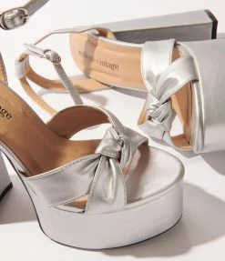 Unique Vintage Brand Unique Vintage Silver Leatherette Bow Platform Heel