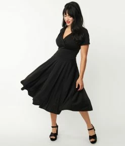 Unique Vintage 1950s Black Short Sleeve Delores Swing Dress