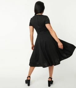 Unique Vintage 1950s Black Short Sleeve Delores Swing Dress