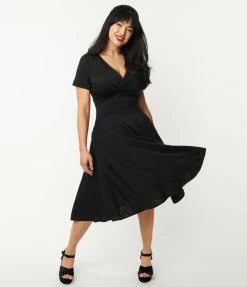 Unique Vintage 1950s Black Short Sleeve Delores Swing Dress