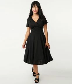Unique Vintage 1950s Black Short Sleeve Delores Swing Dress
