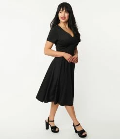 Unique Vintage 1950s Black Short Sleeve Delores Swing Dress