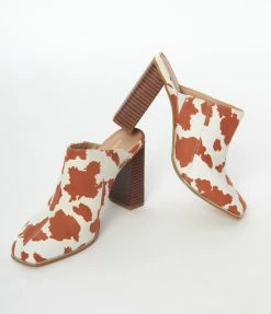 OUR LOVE LETTER INC Heels & Wedges White & Brown Cow Print Suede Mule Heels