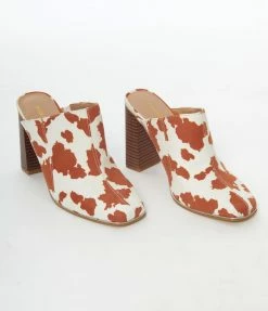 OUR LOVE LETTER INC Heels & Wedges White & Brown Cow Print Suede Mule Heels