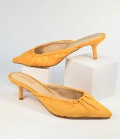 DDK FOOTWEAR, INC Heels & Wedges Mustard Suede Gathered Mule Heels