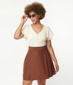 Trending Unique Vintage Cream Flutter Sleeve Blouse