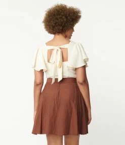 Trending Unique Vintage Cream Flutter Sleeve Blouse