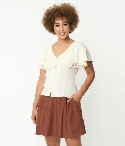 Trending Unique Vintage Cream Flutter Sleeve Blouse