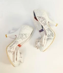 Design Asylum Manufacturing (HK) Limited (Irregular Choice Shoes) Irregular Choice Ivory Bow Lace Bridal Heels