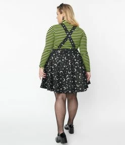 Unique Vintage Plus Size Black Glow In The Dark Moon Print Brionne Pinafore Skirt