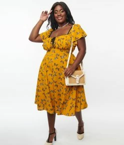 Trending Unique Vintage Plus Size 1950s Marigold & Butterfly Print Swing Dress