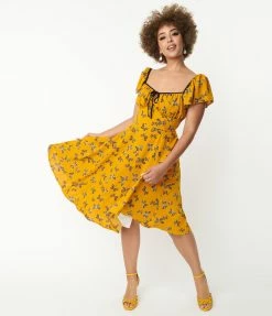 Unique Vintage 1950s Marigold & Butterfly Print Swing Dress