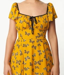 Unique Vintage 1950s Marigold & Butterfly Print Swing Dress