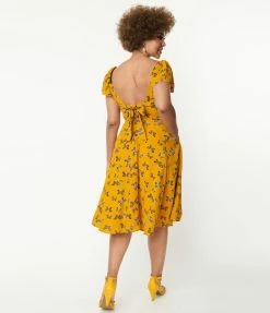 Unique Vintage 1950s Marigold & Butterfly Print Swing Dress