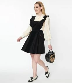 Unique Vintage Black Corduroy Ruffle Pinafore