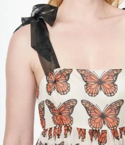 Smak Parlour Clothing Smak Parlor Ivory & Monarch Butterfly Print Babydoll Dress